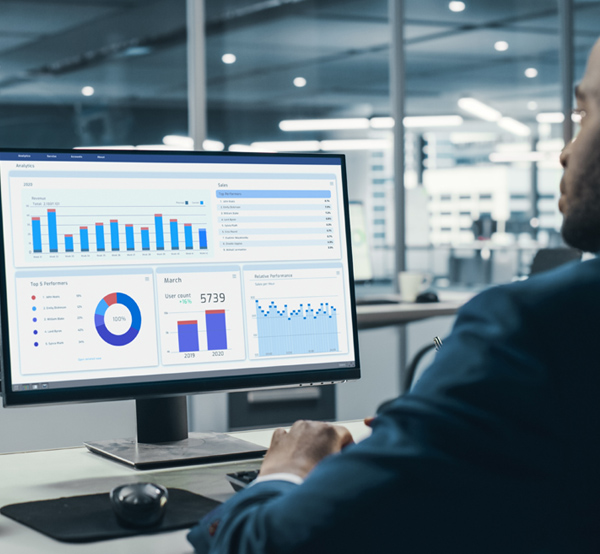 A professional analyzing data visualizations and performance metrics on a desktop screen, representing LIFTUPS Digital’s use of Qualtrics to streamline surveys and optimize decision-making.

